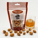 Smoked Bourbon Pistachios with neat bourbon and open pistachios