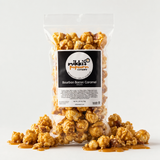 Bourbon Bacon Caramel Popcorn with popcorn pile and caramel drizzle