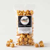 Bourbon Bacon Caramel Popcorn on neutral studio background
