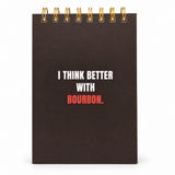 I Think Better With Bourbon spiral notebook, dark brown cover with white and red lettering and a gold top spiral